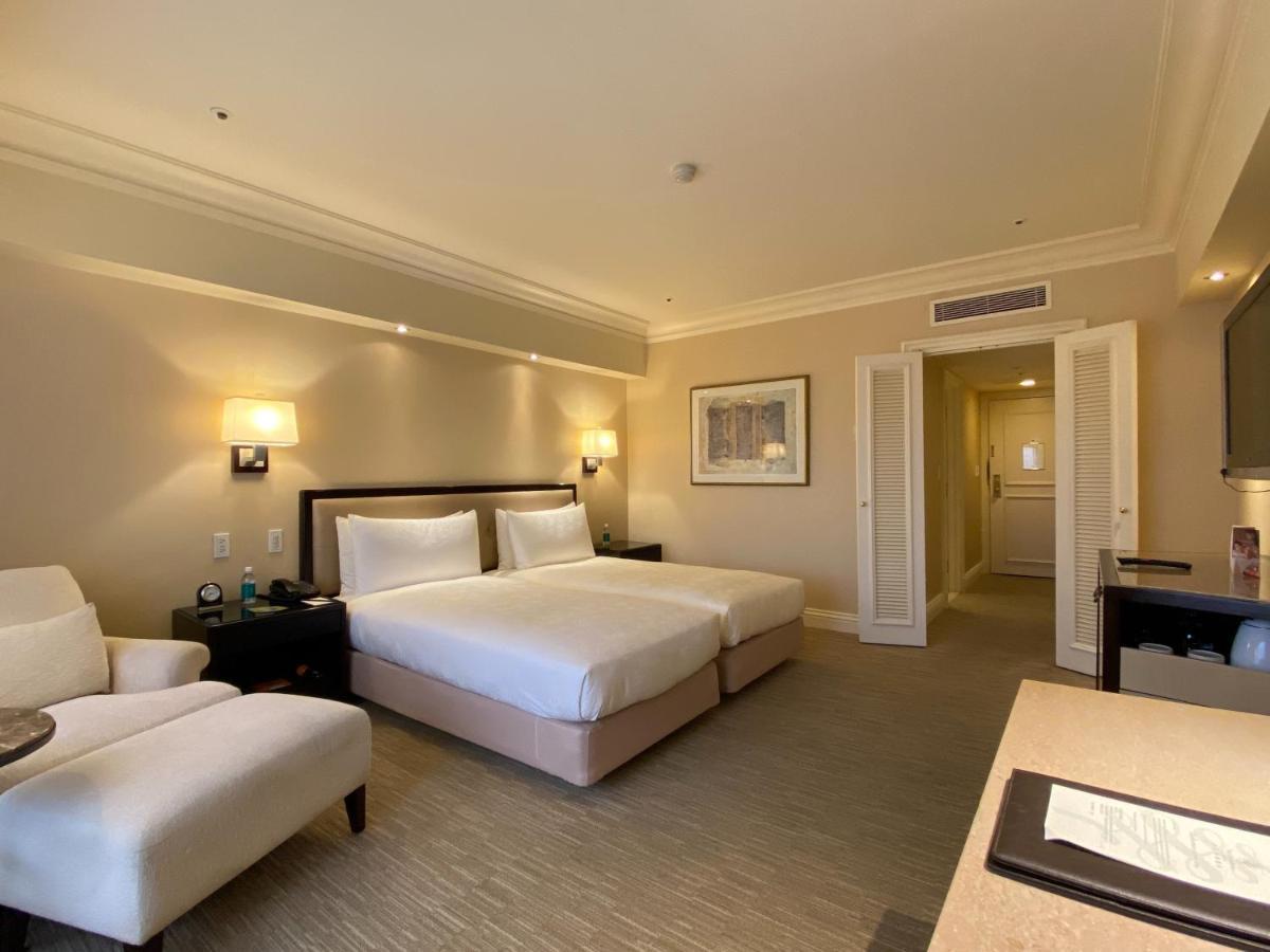 The Sherwood Tchaj-pej Exteriér fotografie A room at the Fullerton Hotel